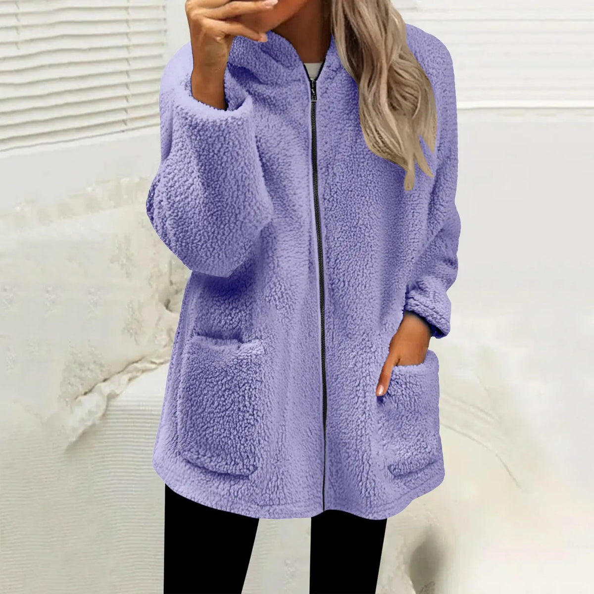 Damen-Fleecejacke Nevina™ mit flauschiger Struktur, großen Taschen und gemütlicher Kapuze