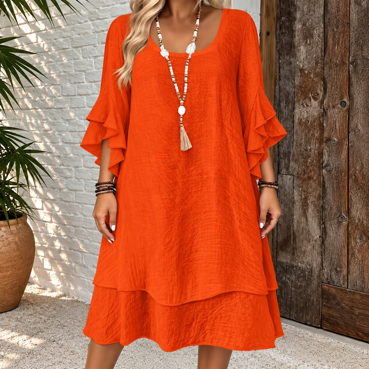 Kleid Iselin™ mit Volantärmeln, weitem Schnitt und gestuftem Saum