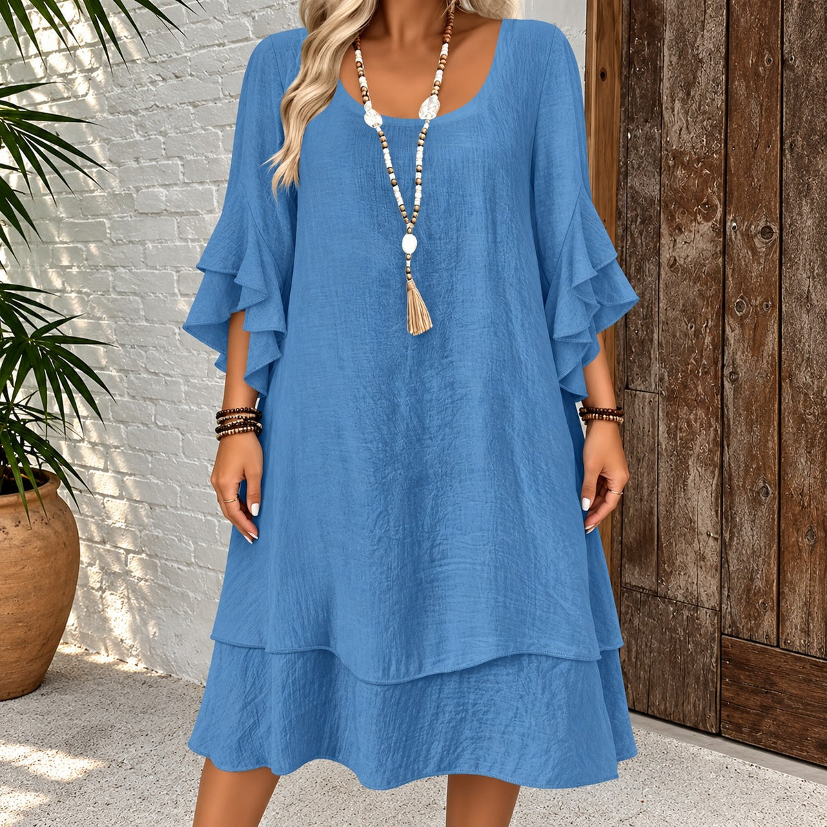 Kleid Iselin™ mit Volantärmeln, weitem Schnitt und gestuftem Saum