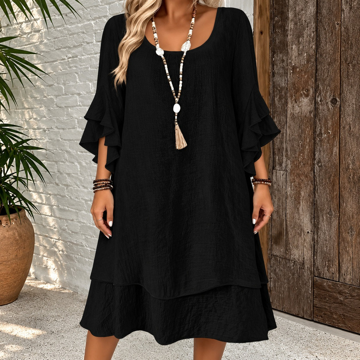 Kleid Iselin™ mit Volantärmeln, weitem Schnitt und gestuftem Saum