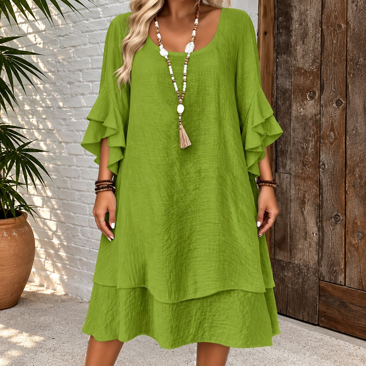 Kleid Iselin™ mit Volantärmeln, weitem Schnitt und gestuftem Saum